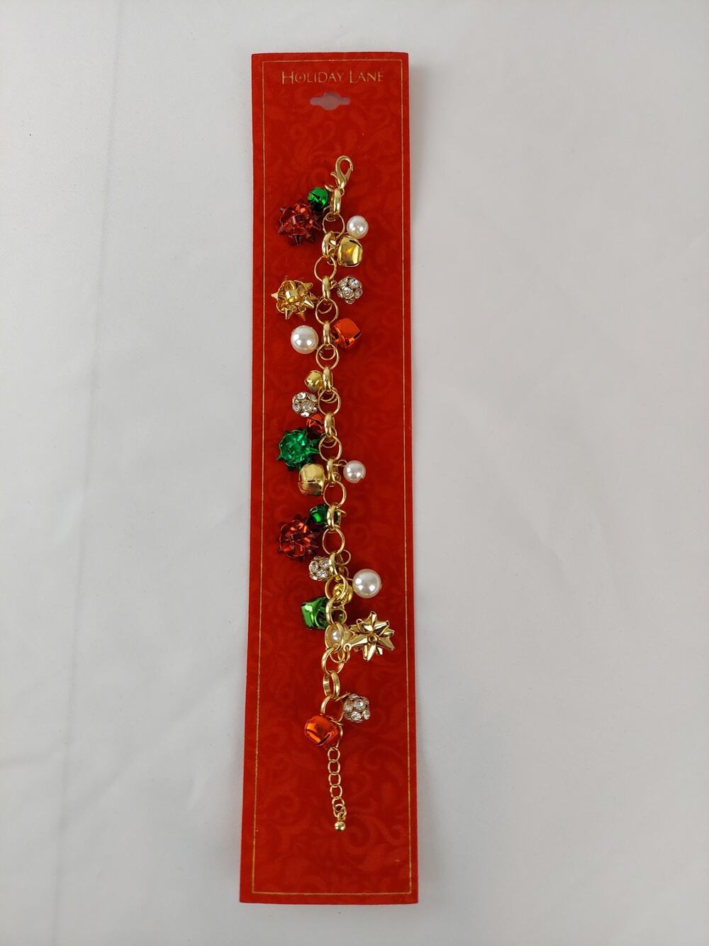 Holiday Lane Tri-Tone  Crystal, Imitation Pearl & Bow Jingle Bell Charm Bracelet